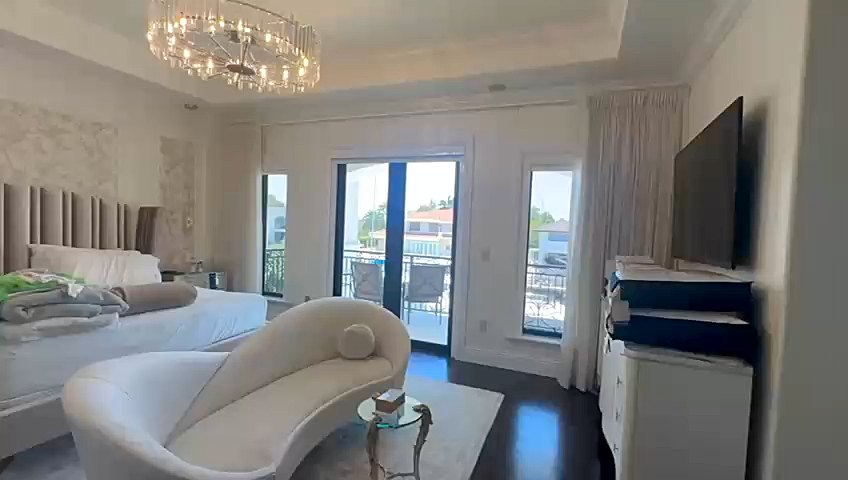 Custom drapery in a Miami master bedroom, by Lavalle Shades